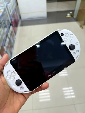 White Sony PS Vita handheld console - good condition