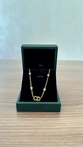 Stunning and 100% authentic Christian Dior Petit CD / Clair D Lune Necklace in gold-finish metal