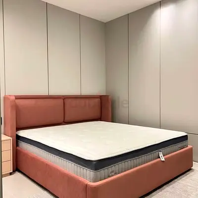 King-size upholstered bed frame with headboard