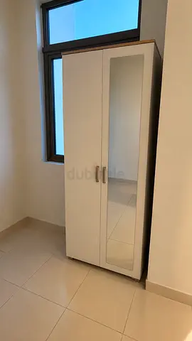Two-door wardrobe with mirror — light wood & white, good condition