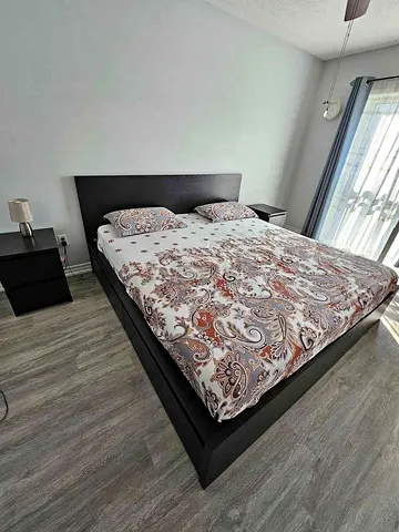 King-size Black MALM bed frame including IKEA King-size mattress from IKEA