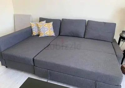 Grey L-shaped Sofa Bed with Storage - Good Condition