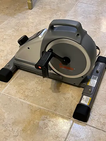 Compact upright exercise bike - light home use, good condition
