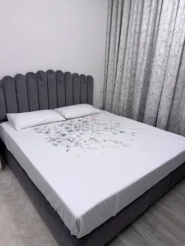 Grey velvet double bed with scalloped headboard - good condition- 200x180cm including mattress+Pad