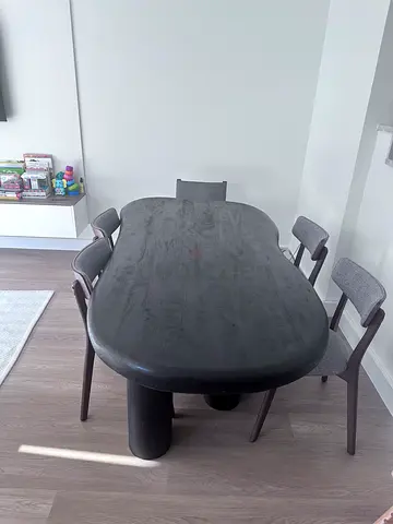 Sleek Dark Wood Dining Table