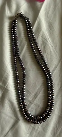 String of twin row of pearls with crystals and crystal clasp