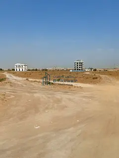 Residential-commercial land for sale in Al-Malha, near the school and situated on a 24-meter-wide st
