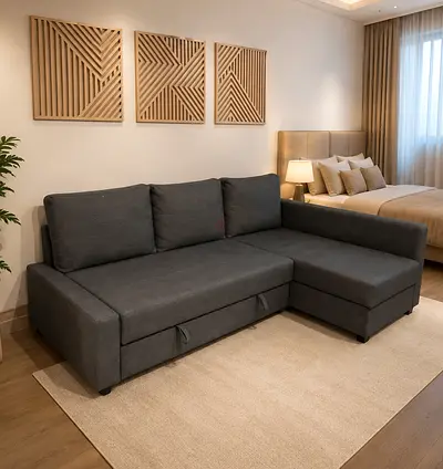 Gray L-shaped Sofa with Storage and Pull-out Bed - Good Condition