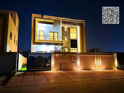 Luxury villa for sale, including registration and ownership fees, near Al Safir Commercial Center, featuring a modern design and high-end finishes.