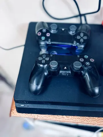 Sony PlayStation 4 Slim 1 tb with 2 Controllers - Good Working Condition