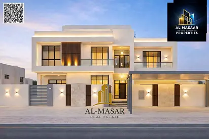 Two-story villa with a roof terrace in Al Muwaihat, featuring 7 master bedrooms and an internal ele