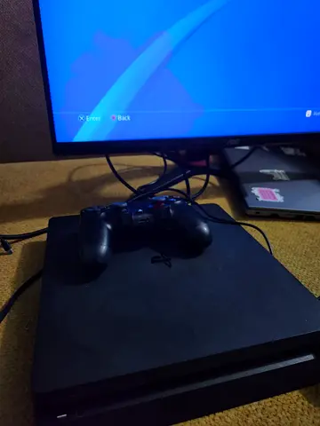 PlayStation 4 Slim 1TB with DualShock Controller - Good Working Condition