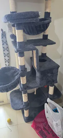 Large multi-level cat tree with scratching posts and beds
