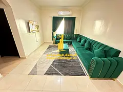 Luxury apartment, second occupancy, two bedrooms, living room, and open balcony. Ajman, Al Muwaihat