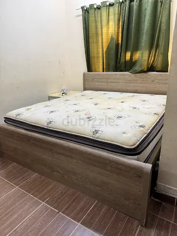 Bed with mattress