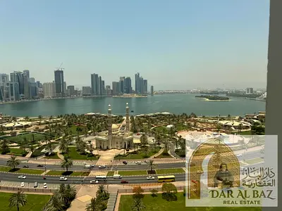 Two beautiful master bedrooms, a spacious living area, built-in wardrobes, and an open view.