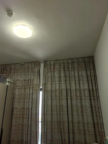 Full-length beige patterned curtains - set for bedroom