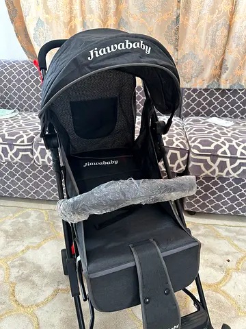 Compact Folding Baby Stroller with Trolley Handle – Excellent Condition (AED 120)