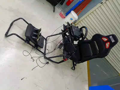 Next Level Racing Cockpit with Logitech G923 Wheel, Pedals & Gear Shifter – AED 2,500