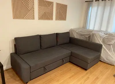 Gray L-shaped 3-seater Sofa bed with Chaise - Good Condition