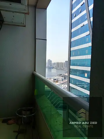 اجمل غرفتين وصالة في أبراج الأورينت مع باركن، إيجار سنوي 50,000 درهم، 4 دفعات، شيك تأمين 4,000 درهم، موقع مميز وخدمات راقية.