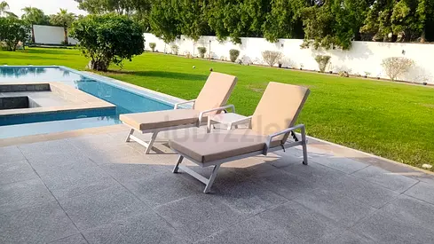 Pair of outdoor sun loungers with cushions — brand new