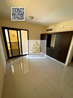 Two-bedroom apartment with a living room, annual rent, with built-in wardrobes and a balcony.