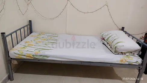 Single metal bed frame with mattress — good condition