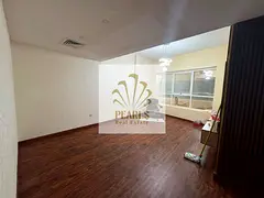 Two bedrooms and a living room in Garden City Towers, 2 bathrooms, spacious areas, modern finishes, 