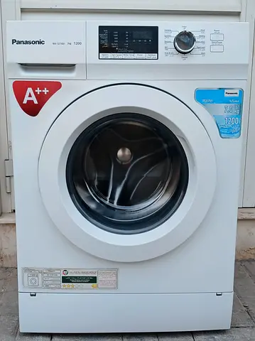 fully automatic Panasonic 7kg front load washing machine, condition working perfectly,  white color.