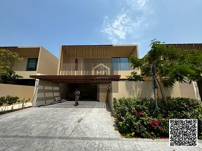 A very luxurious and exceptional villa for sale in the upscale Al-Zourah area, with a stylish modern design and a distinctive facade on a huge land pl