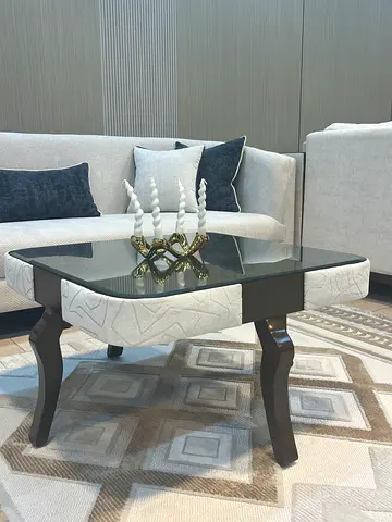 Modern Black Glass Coffee Table with Upholstered Accent Sides