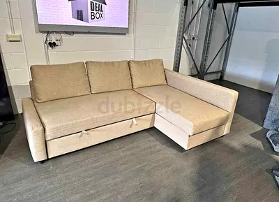 Beige L-shaped Sofa Bed with Storage - Good Condition