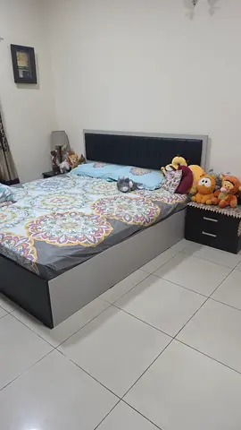 King size bed with mattress and bedside 2 drawers - good condition. Mattress very good condition.