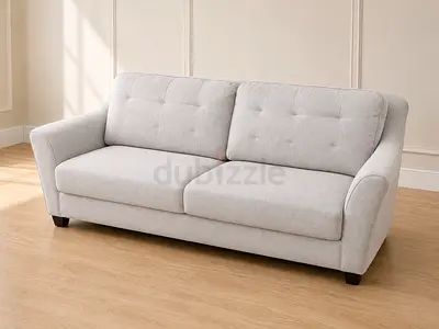 Modern Grey Sofa with Tufted Backrest