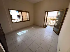 A spacious 2-bedroom apartment is available for annual rent in Al Nuaimiya 3, ideally located near S