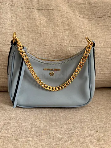 Light blue Michael Kors shoulder bag with gold chain