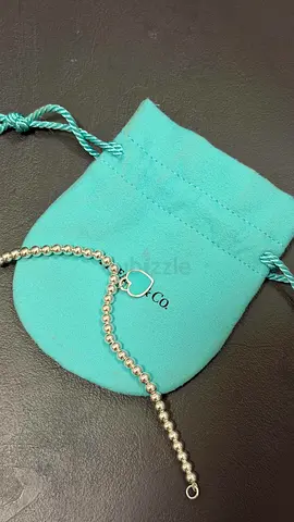Tiffany & Co. Silver Necklace with Blue Tag