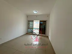 Free air conditioning, free parking, spacious two-bedroom apartment with living room, wardrobes, and