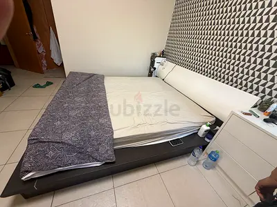 King size platform bed with headboard, mattress and storage base - good condition