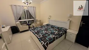 A distinctive apartment featuring a bedroom, a living room, and a master bathroom, located in Sharj