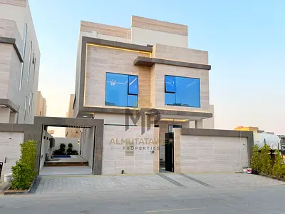 Luxury 3-story villa for sale in one of Ajman's best areas, including registration and ownership fees, with excellent finishing and a strategic locati
