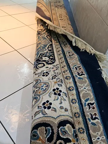Traditional navy and cream Persian-style large carpet, good condition
