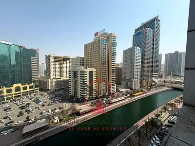 غرفتين وصالة مع بلكونة باركن مجانا إطلالة بحرية وإطلالة القصباء غرفة خادمة جيم ومسبح مجانا 4 دفعات تاور عائلي قرب مخرج دبي