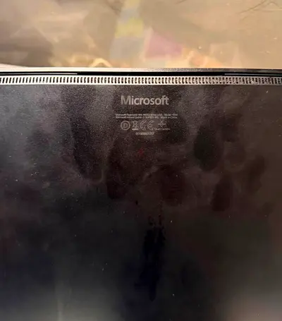 Microsoft Surface (tablet/laptop) - used back casing visible