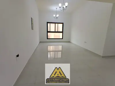 Two-bedroom apartment in Al Nuaimiya 1 Ajman, balcony, 2 bathrooms, central AC, maintenance free, AED 42,000.