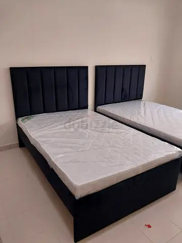 Pair of Dark Blue Upholstered Bed Frames with Mattresses (Twin + Double)