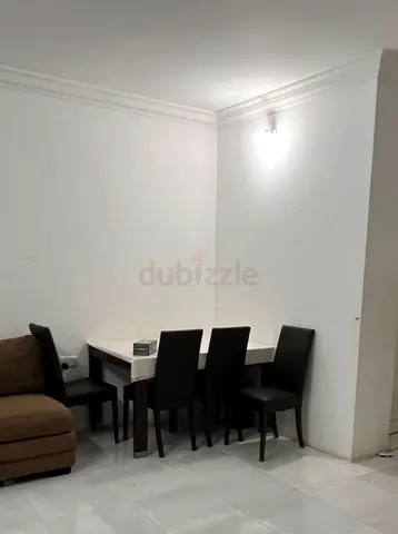 Modern 4-Seater Dining Set with High Back Leatherette Chairs