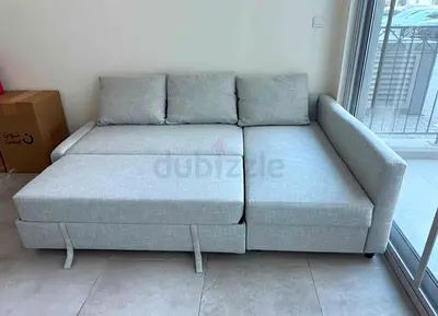 Grey fabric l-shaped sofa bed