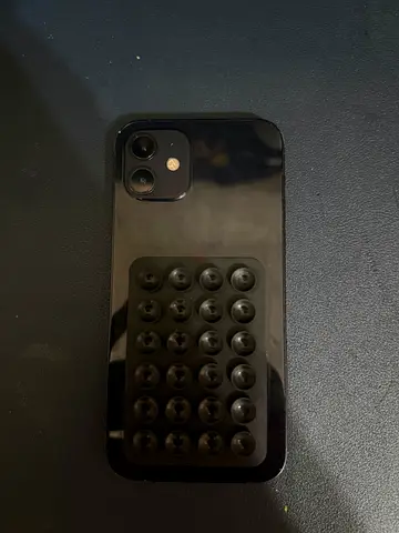 iPhone 12 (Black) - Good working condition, used with magnetic mount